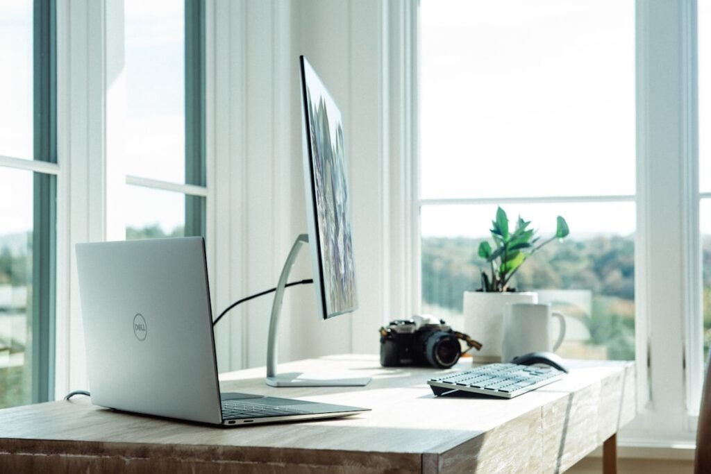person working from home with back pain ergonomic home office setup